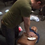 Bonnie - Dan giving CPR with AED patches